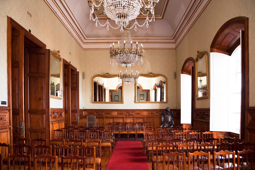 A crystal flush-mount chandelier brings classic elegance without consuming too much vertical space (ideal for low-ceiling rooms).