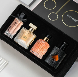 4 different types of perfumes in a black box