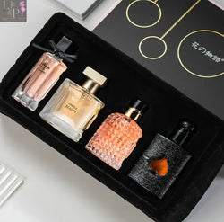 4 different types of perfumes in a black box