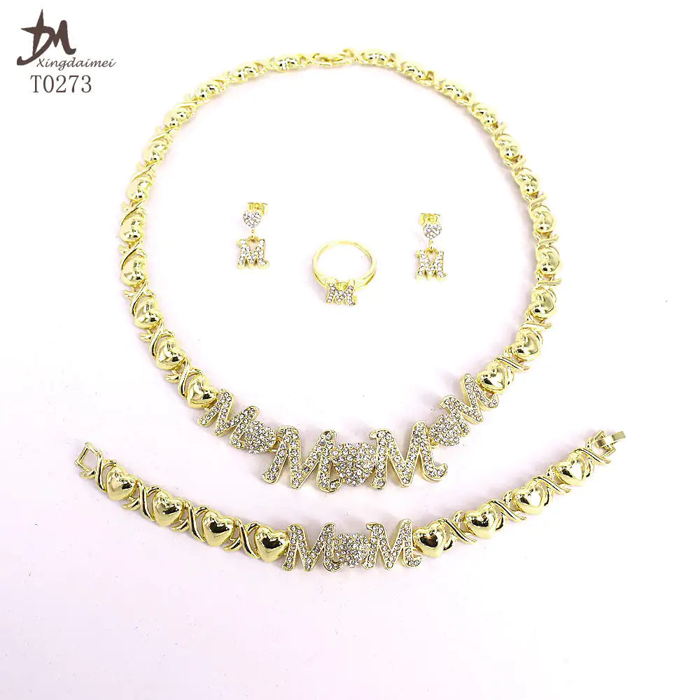 Women gold-plated jewelry set featuring earrings, necklace, and bracelet with elegant gold finish from Lamp Post.