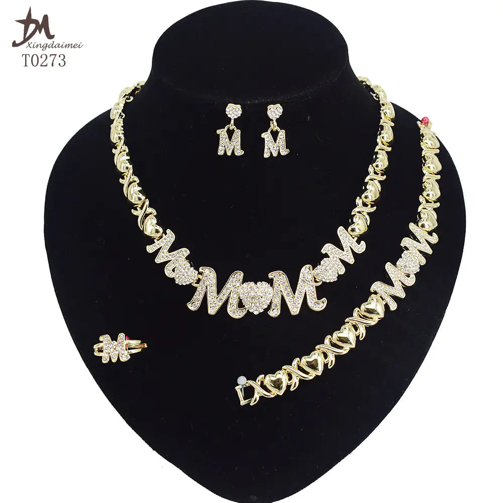 Women gold-plated jewelry set by Lamp Post featuring earrings, necklace, and bracelet with elegant gold finish.