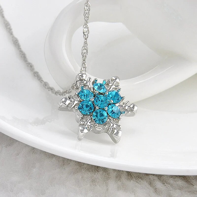 Women necklace set by Lamp Post featuring two elegant pendant necklaces with delicate chains and stylish designs.