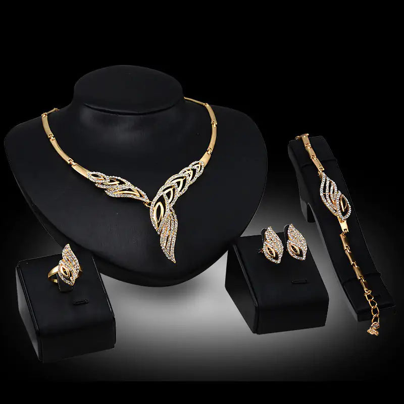 Gold Indian bridal jewelry set for women, featuring intricate traditional designs and matching necklace, earrings, and accessories.