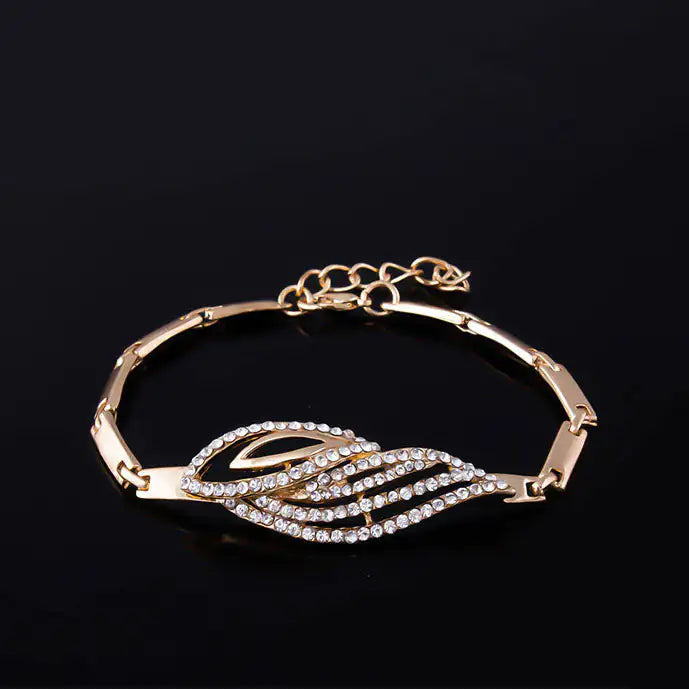 Gold Indian bridal jewelry set for women featuring intricate designs, including necklace, earrings, and bangles from Lamp Post.