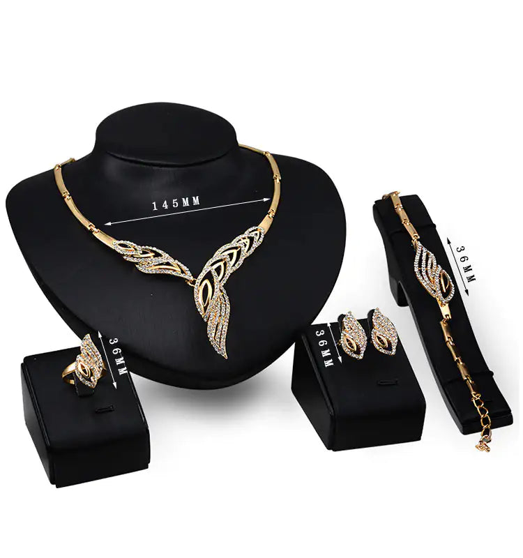 Gold Indian bridal jewelry set for women, featuring intricate traditional jewelry with earrings, necklace, and bangles from Lamp Post.