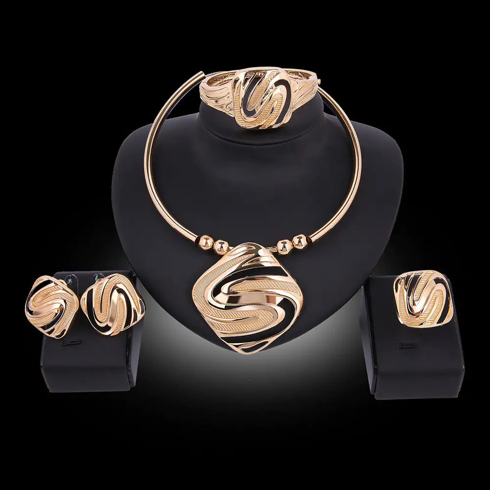 Gold Indian bridal jewelry set for women with intricate traditional designs, featuring necklace, earrings, and bangles.