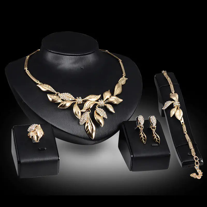 Gold Indian bridal jewelry set for women with intricate designs, including necklace and earrings, by Lamp Post.
