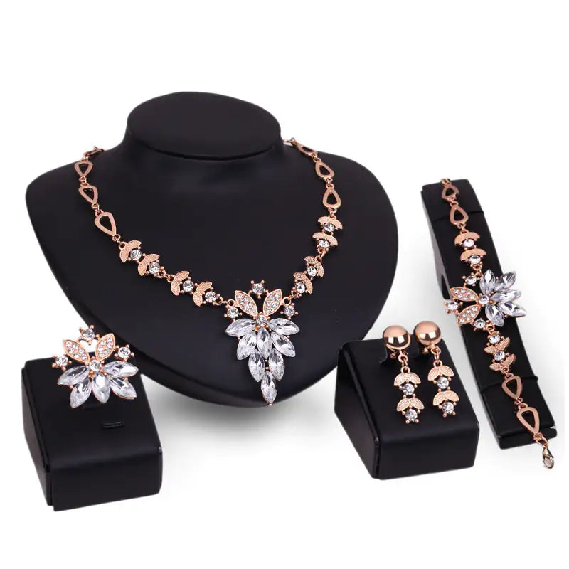 Gold Indian bridal jewelry set for women featuring traditional necklace, earrings, and bangles, crafted by Lamp Post.