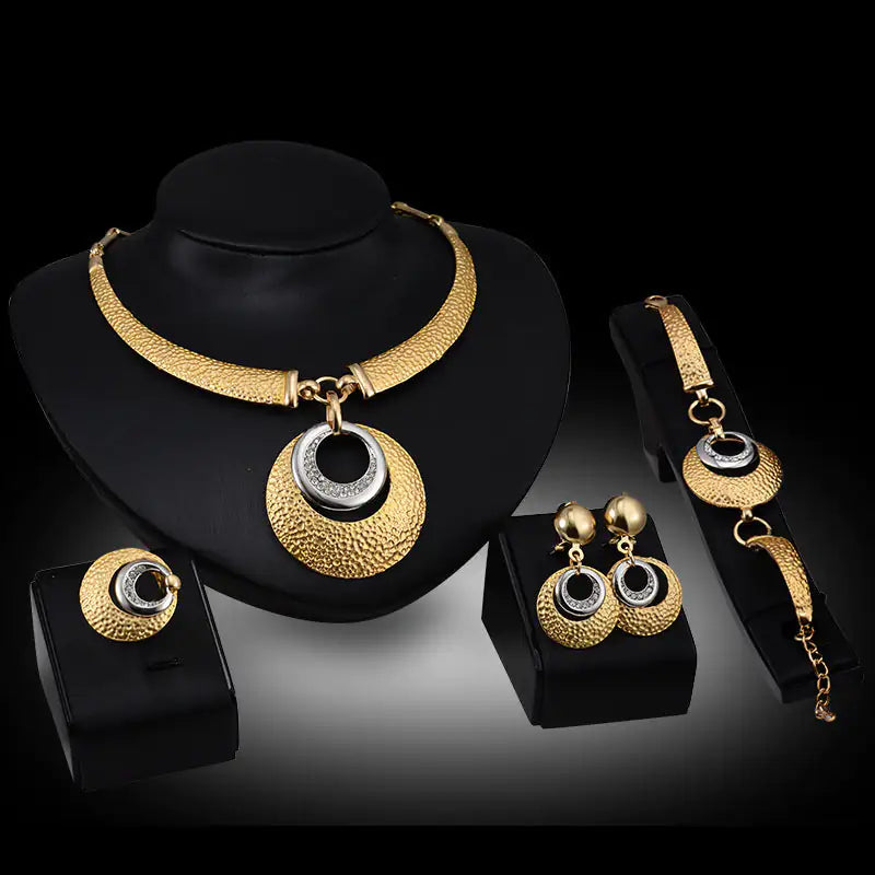 Gold Indian bridal jewelry set for women, includes intricate necklace and earrings, elegant traditional bridal jewelry by Lamp Post