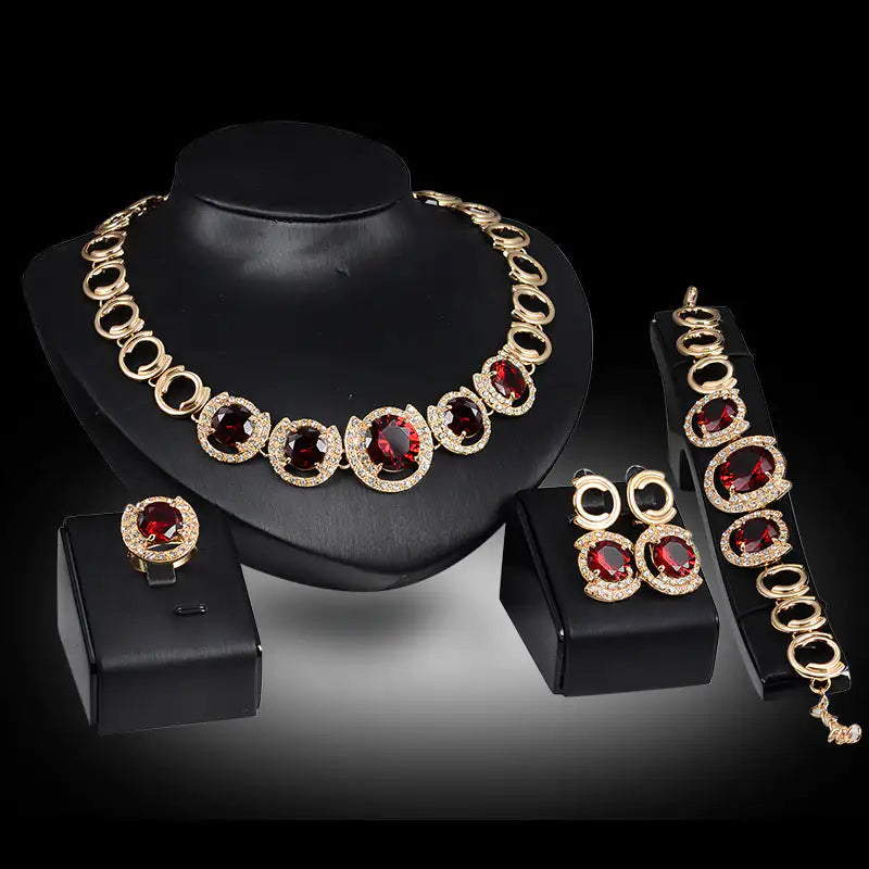 Gold Indian bridal jewelry set for women featuring intricate traditional designs, including necklace, earrings, and bangles.