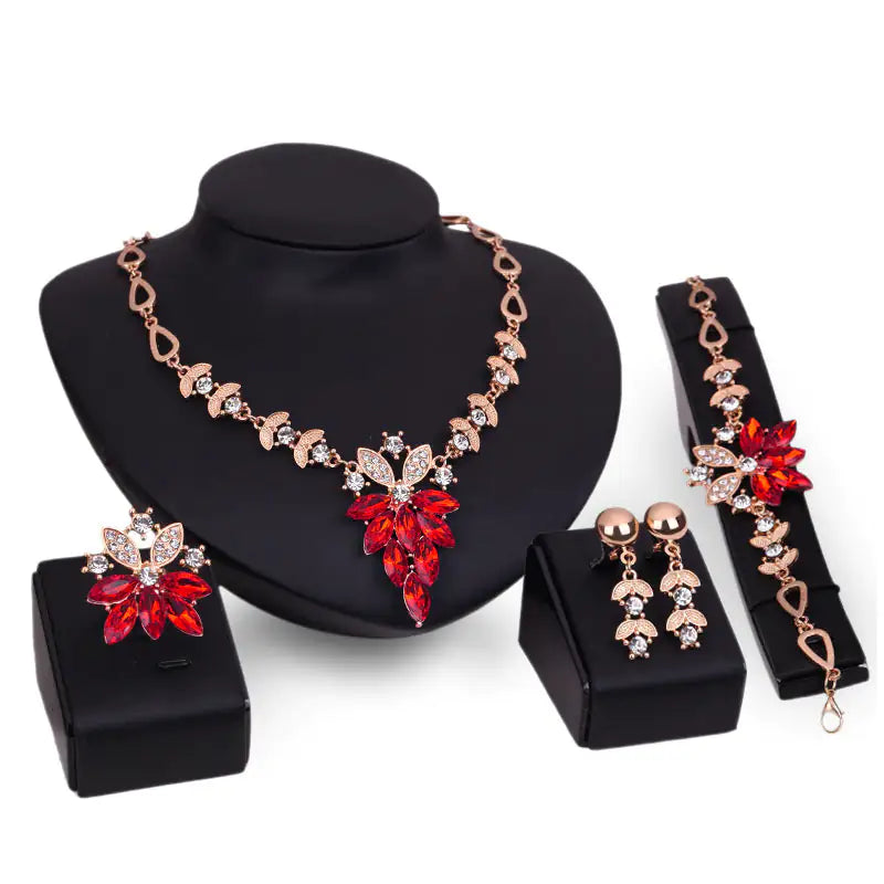 Gold Indian bridal jewelry set for women featuring intricate traditional designs, including necklace, earrings, and bangles.