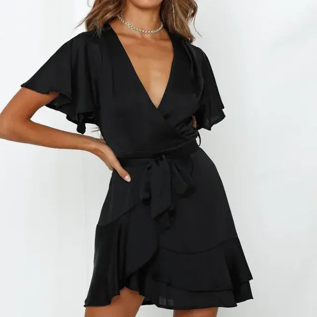 Light orange summer V-neck ruffle dress for women by Lamp Post, featuring a flowy design and delicate ruffle details.