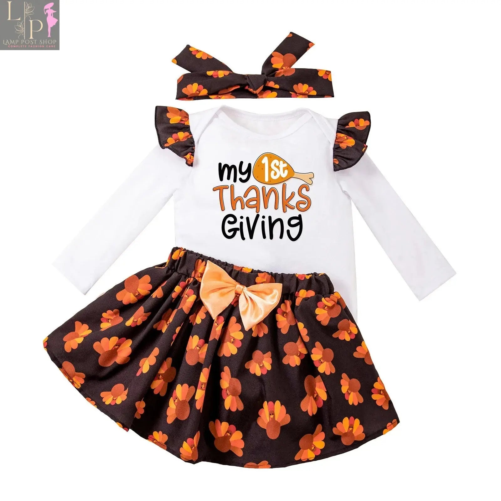 Girls' long sleeve Thanksgiving dress by Lamp Post featuring a cute cartoon turkey print for babies aged 12-18 months.