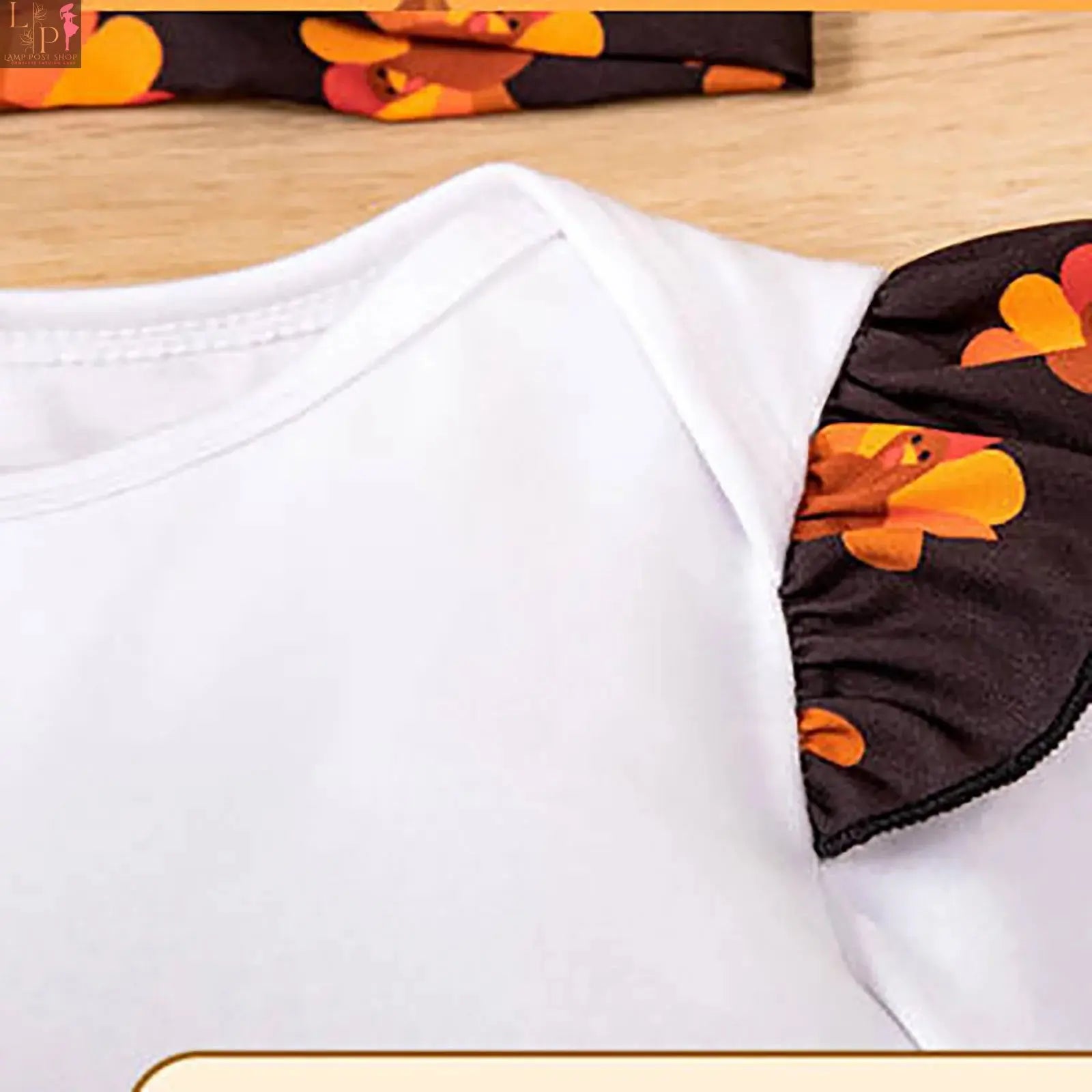 Girls' long sleeve Thanksgiving dress by Lamp Post featuring a cute cartoon turkey print, suitable for babies 12-18 months.