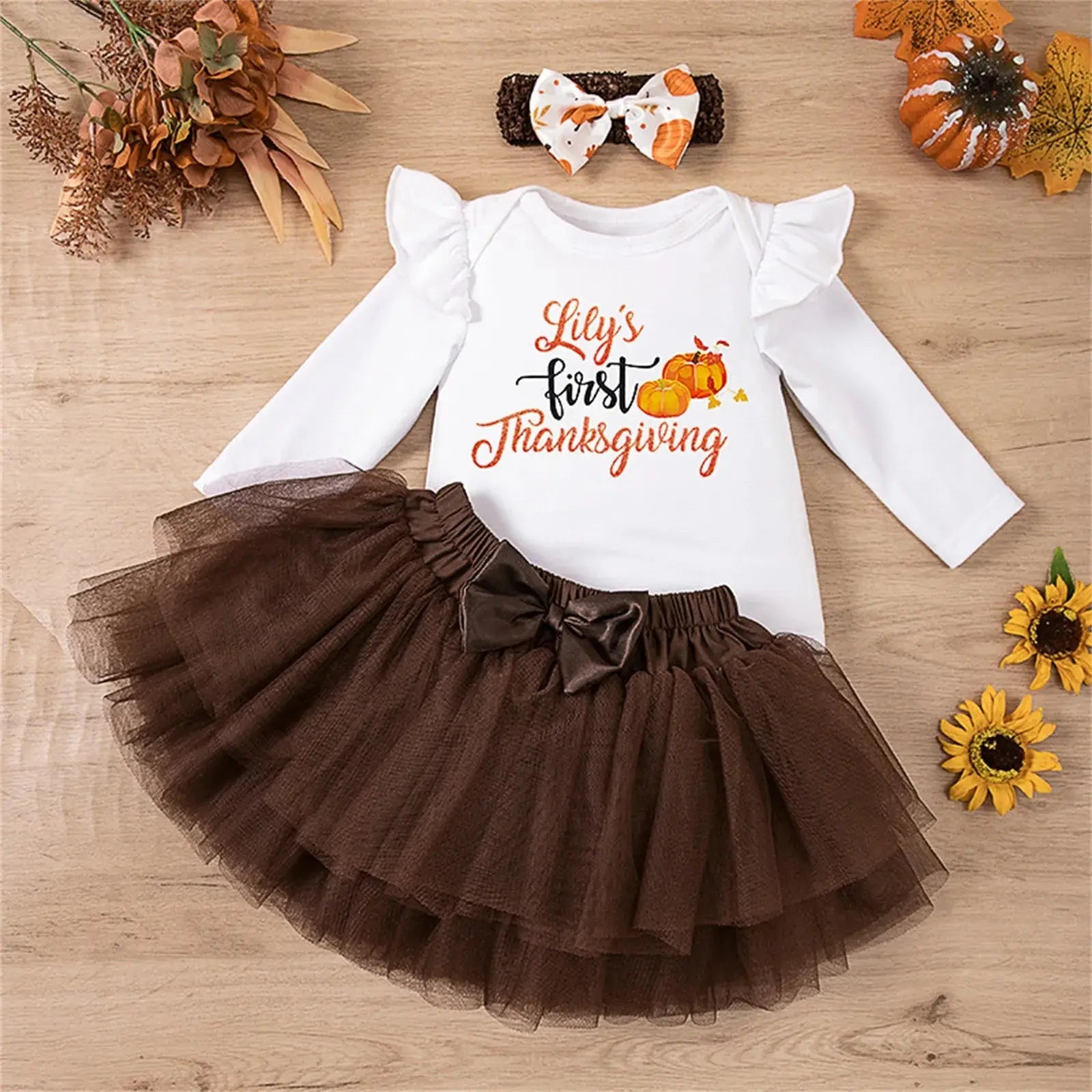 White newborn baby girl Thanksgiving outfit set by Lamp Post, includes bodysuit, headband, and matching clothes for 0-24 months.