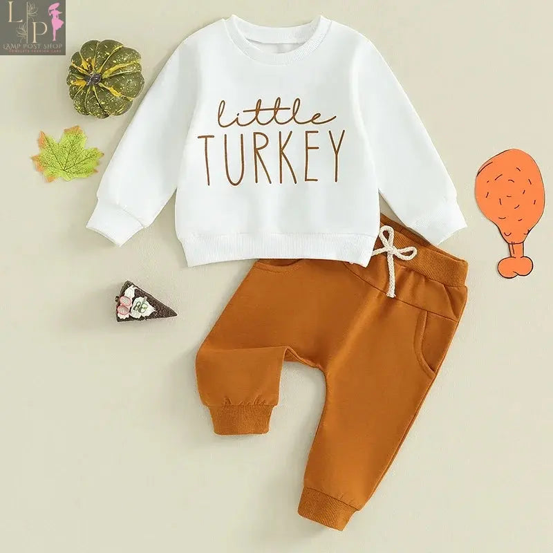Baby boy autumn Thanksgiving outfit by Lamp Post with letter print long sleeve sweatshirt and solid color pants for toddlers.