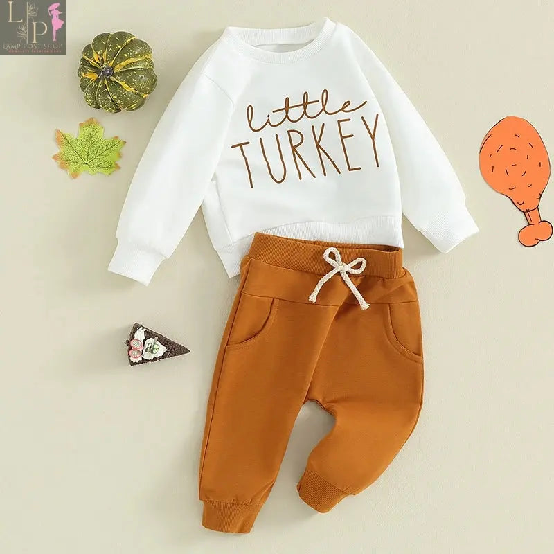Toddler baby boy outfit by Lamp Post featuring a letter print long sleeve sweatshirt and solid color pants for Thanksgiving.