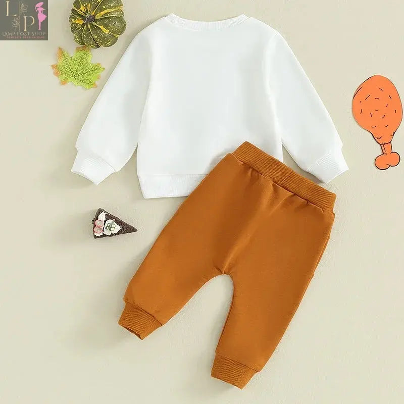 Baby boy autumn Thanksgiving outfit with letter print long-sleeve sweatshirt and solid color pants, by Lamp Post.