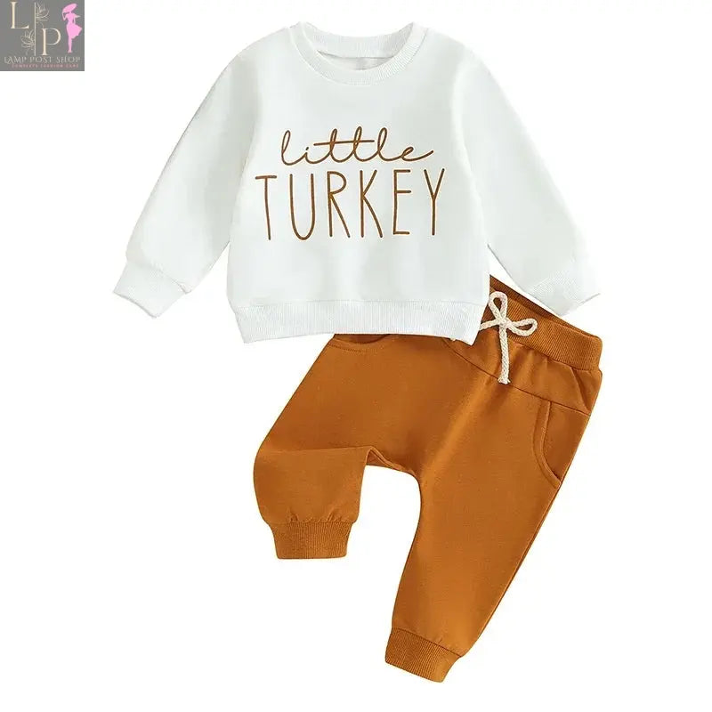 Baby boy outfit by Lamp Post featuring a letter print long sleeve sweatshirt and solid color pants for autumn Thanksgiving Day.