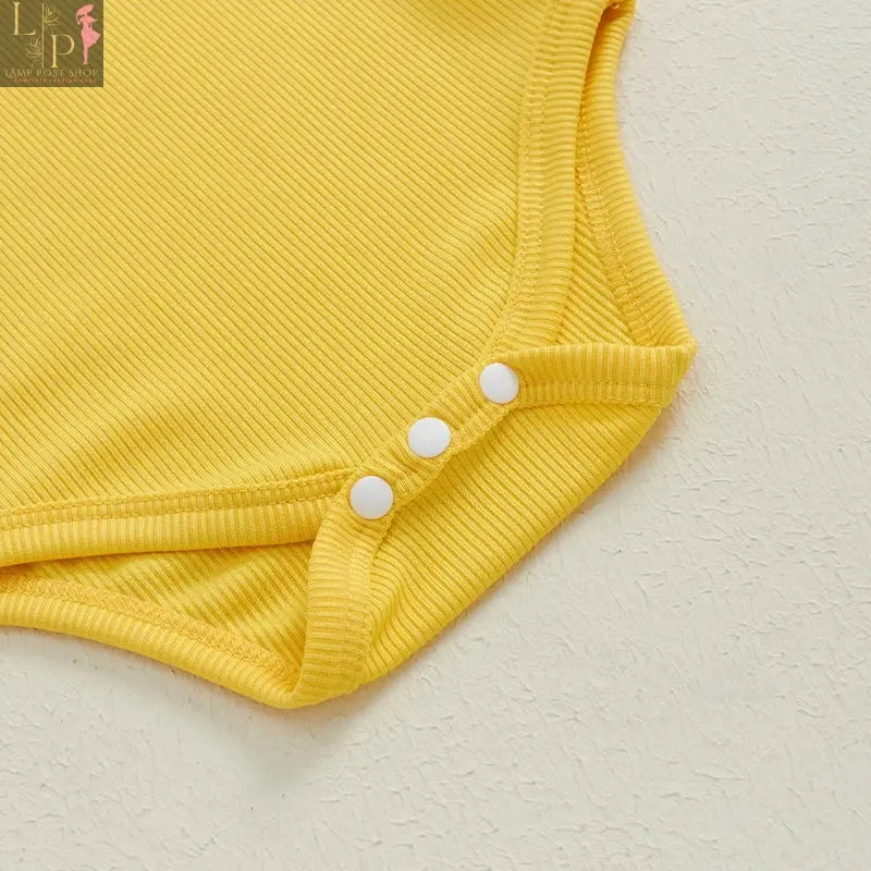 Baby girl long sleeve Thanksgiving jumpsuit by Lamp Post with turkey design, yellow color, perfect for fall celebrations.