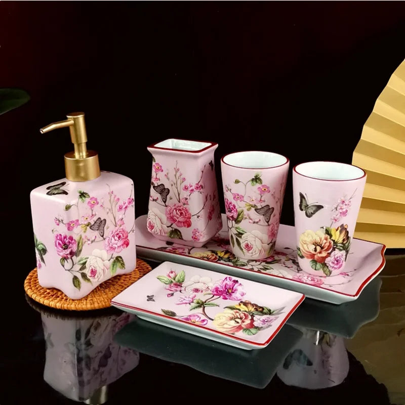 Lamp Post luxury pink rose ceramic bath accessories set with toothbrush holder, soap dispenser, soap dish, and bathroom cup.