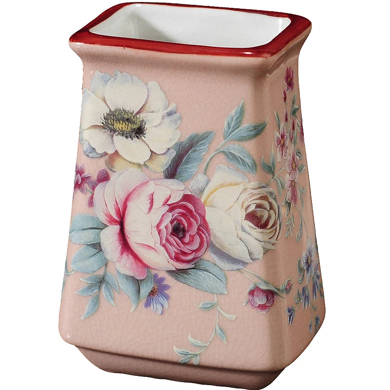 Lamp Post luxury pink rose ceramic bath accessories set including toothbrush holder, soap dispenser, soap dish, and bathroom cup.