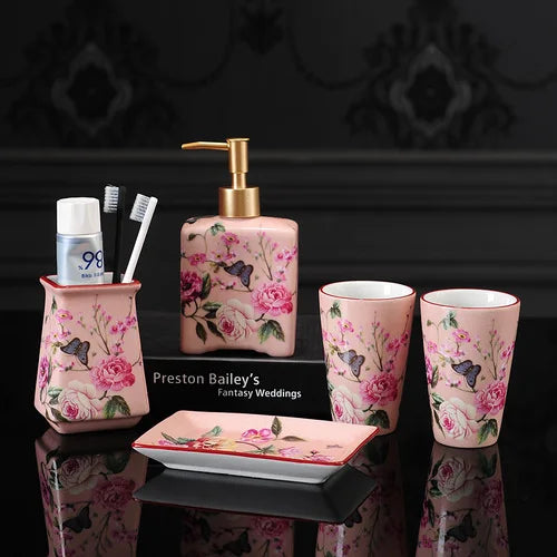 Lamp Post luxury pink rose ceramic bath accessories set with toothbrush holder, soap dispenser, soap dish, and bathroom cup.