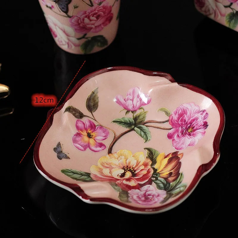Lamp Post luxury pink rose patterned bath accessories set with ceramic toothbrush holder, soap dispenser, soap dish, and bathroom cup.