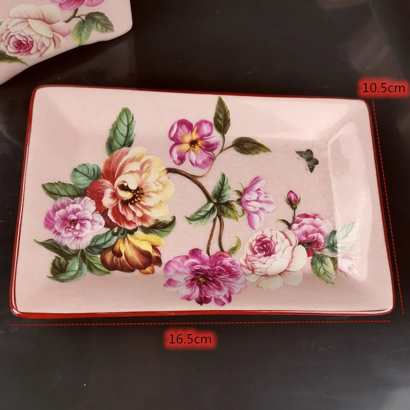 Lamp Post luxury pink rose ceramic bath accessories set, including toothbrush holder, soap dispenser, soap dish, and bathroom cup.