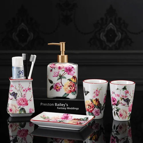 Lamp Post luxury pink rose ceramic bath accessories set includes toothbrush holder, soap dispenser, soap dish, and bathroom cup.