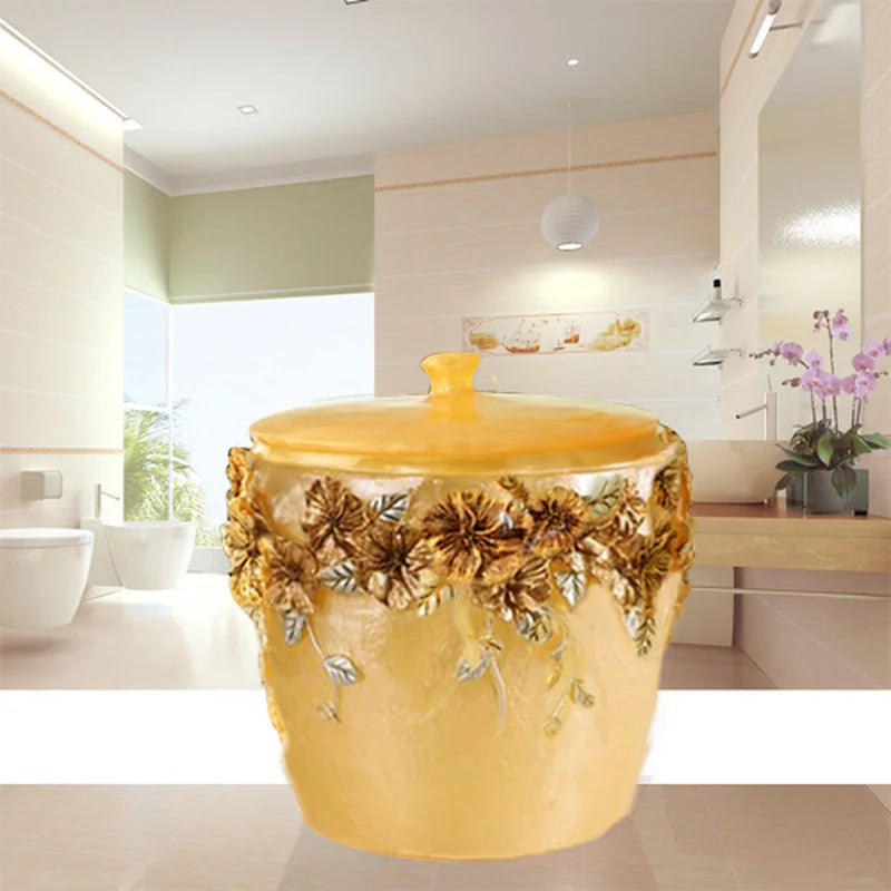 Gold Lamp Post bath accessories set including lotion bottle, toothbrush holder, soap dish, tissue box, toilet brush, and garbage can.
