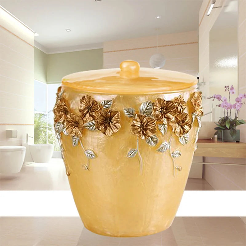 Lamp Post gold bath accessories set including lotion bottle, toothbrush holder, soap dish, tissue box, toilet brush, and trash can.