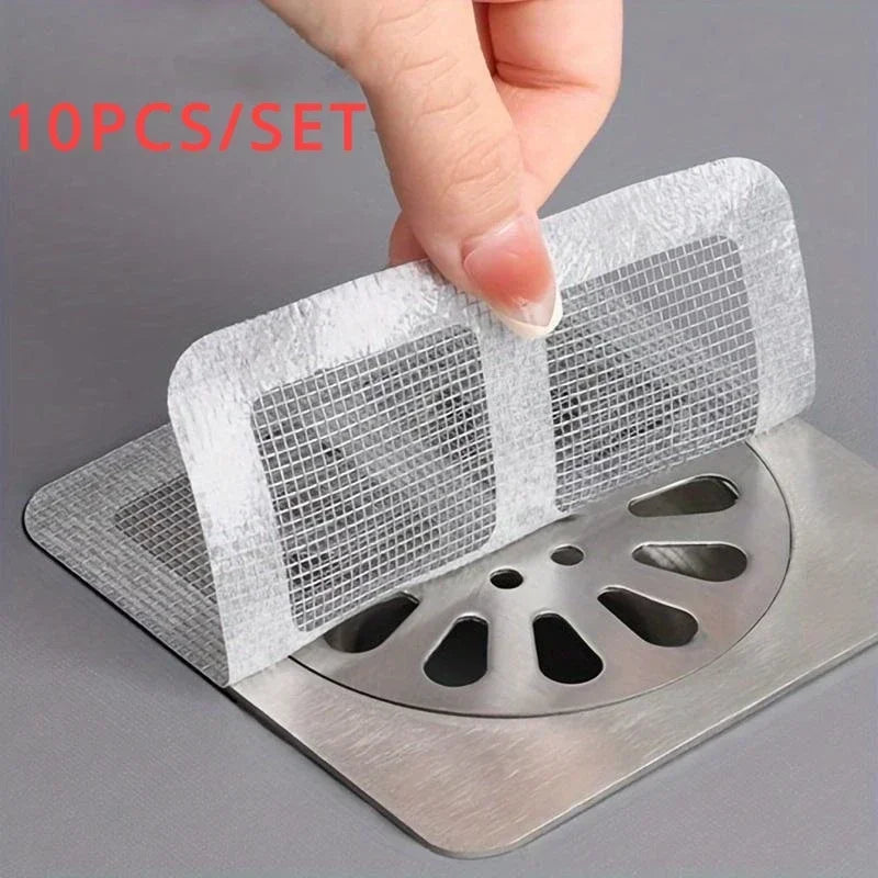 Set of 10 disposable shower drain hair catchers by Lamp Post, bathroom tools for trapping hair in kitchen and bathroom drains.