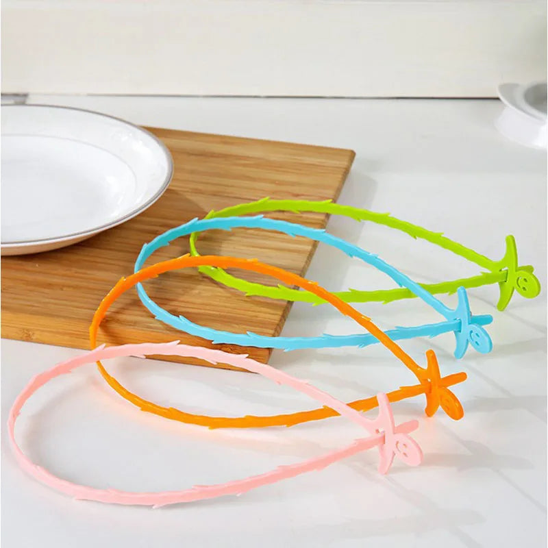 Lamp Post bathroom hair catchers for toilet and sewer clogs, plastic tools to prevent bathroom drain blockages.