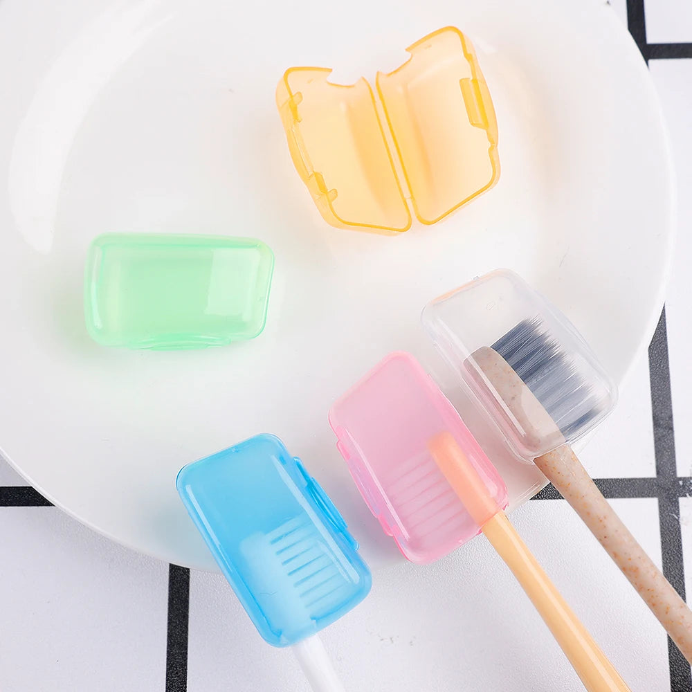 Set of five portable toothbrush head cover caps by Lamp Post, colorful bathroom tool accessories for toothbrush protection.