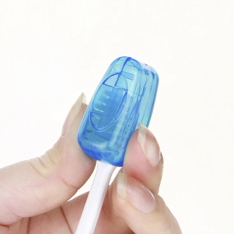Set of five portable toothbrush head cover caps in various colors, designed for bathroom use by Lamp Post.