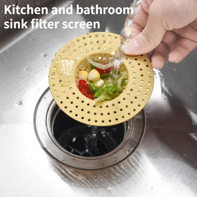 Transparent hair filter sink drain stopper by Lamp Post for bathtubs and showers, prevents hair clogs in bathroom drains.