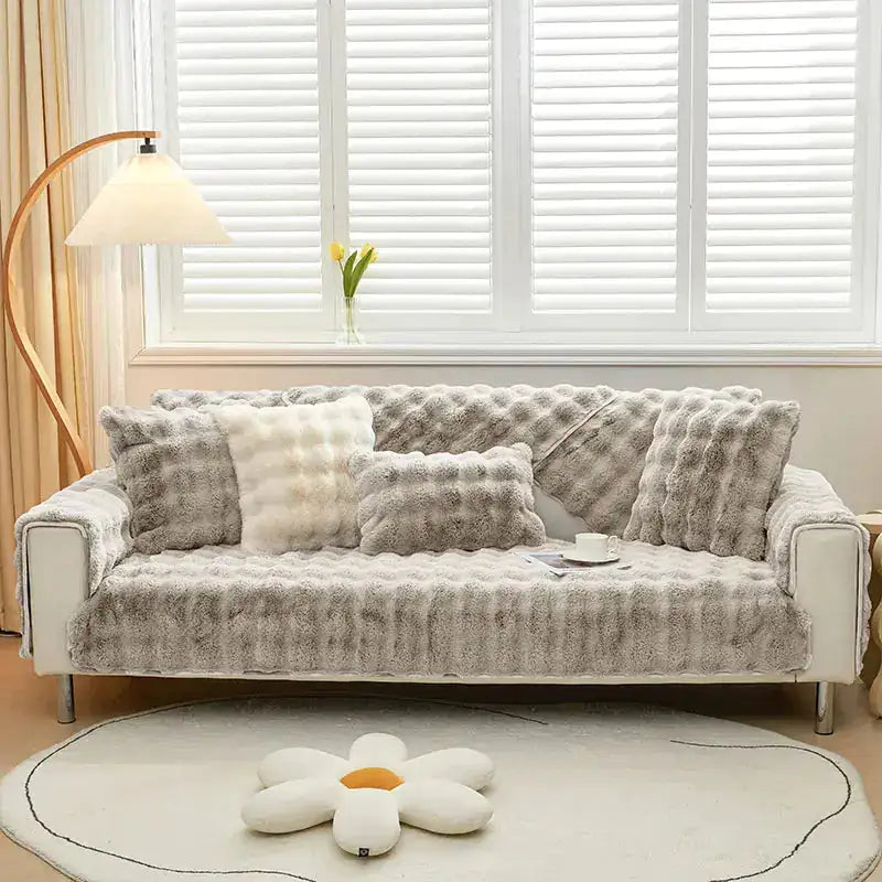 Beige Lamp Post non-slip sofa cover fitted over a sofa to protect and enhance furniture with secure grip.