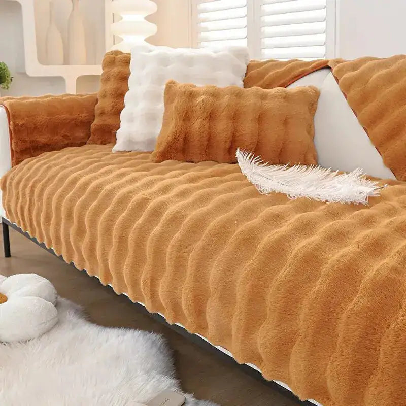 Beige non-slip sofa covers from Lamp Post, with textured fabric and secure fit, designed to protect and refresh your sofa.