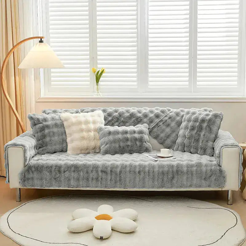Beige Lamp Post non-slip sofa cover draped over a sofa, showing fabric texture and secure fit for protection and style.