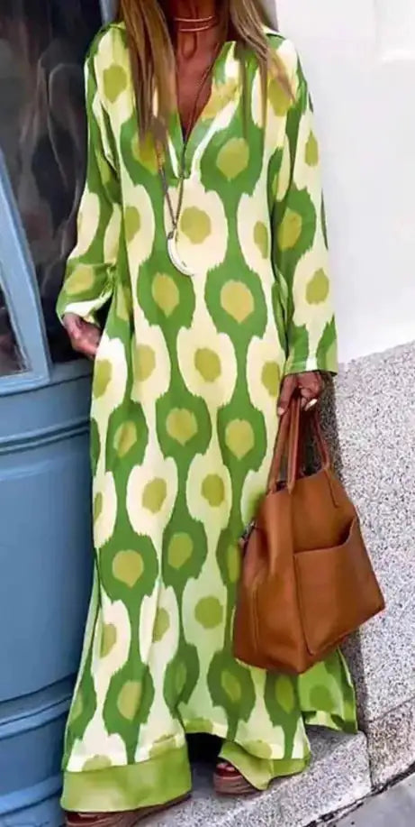 Beige women's maxi dress by Lamp Post with flowing fabric and sleeveless design, perfect for casual or summer wear.