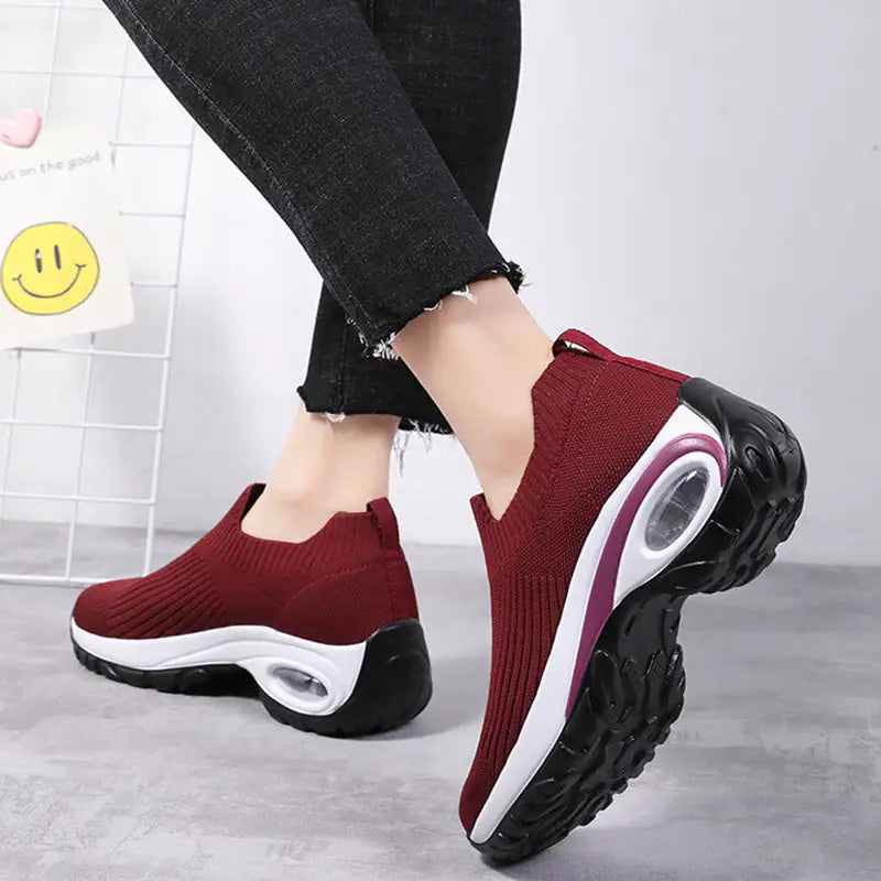 Black women's walking sneakers by Lamp Post featuring comfortable design and supportive soles for everyday activity.