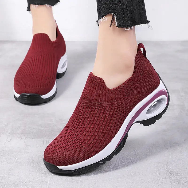 Black women's walking sneakers by Lamp Post featuring a comfortable design and stylish look for everyday active wear.
