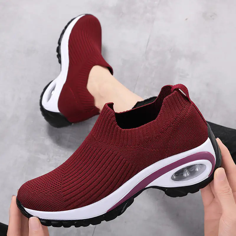 Black women's sneakers by Lamp Post, designed for walking, with comfortable fit and casual style.