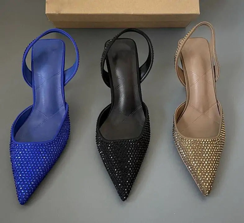 Black women's fashion shoes by Lamp Post, stylish and comfortable footwear for women, shown in a close-up image.