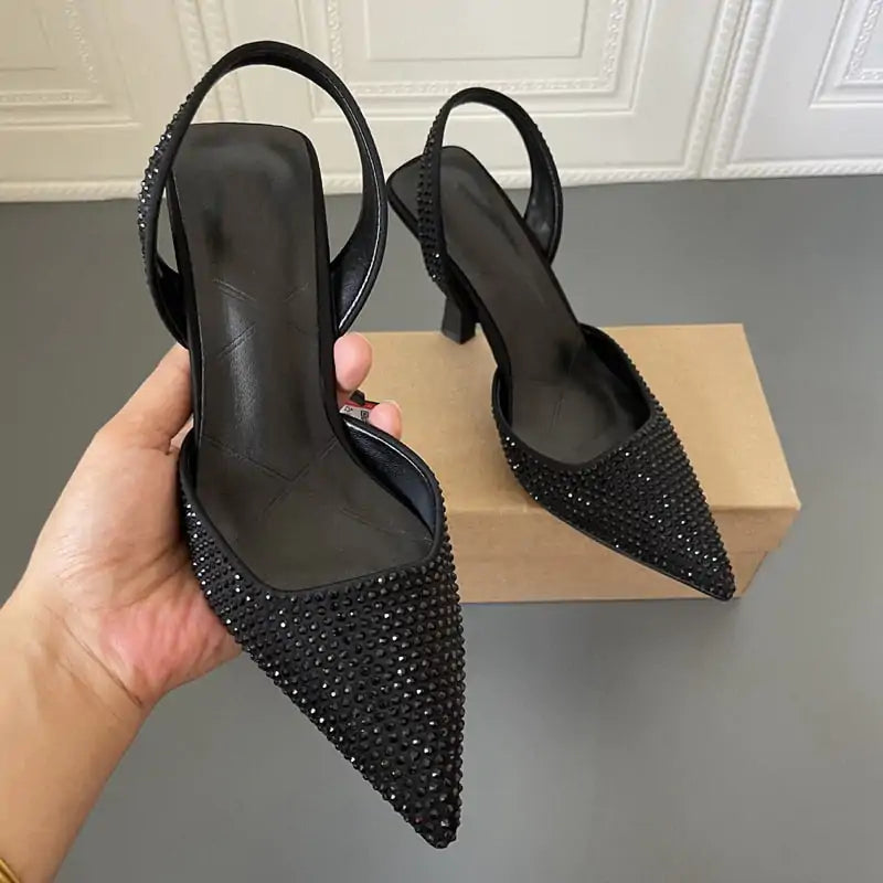 Black women's fashion shoes by Lamp Post, stylish and comfortable footwear with sleek design and modern details.