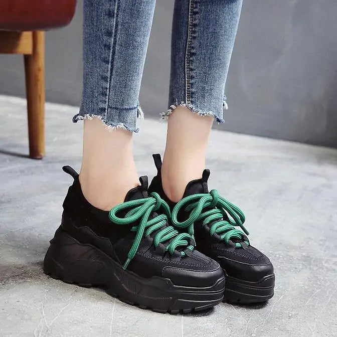 Black Bruneau women’s sneakers by Lamp Post featuring stylish design and comfortable fit.