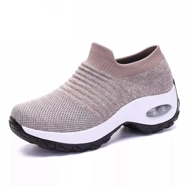Black and gray women's sneakers by Lamp Post featuring a sleek, comfortable design with stylish laces and a cushioned sole.