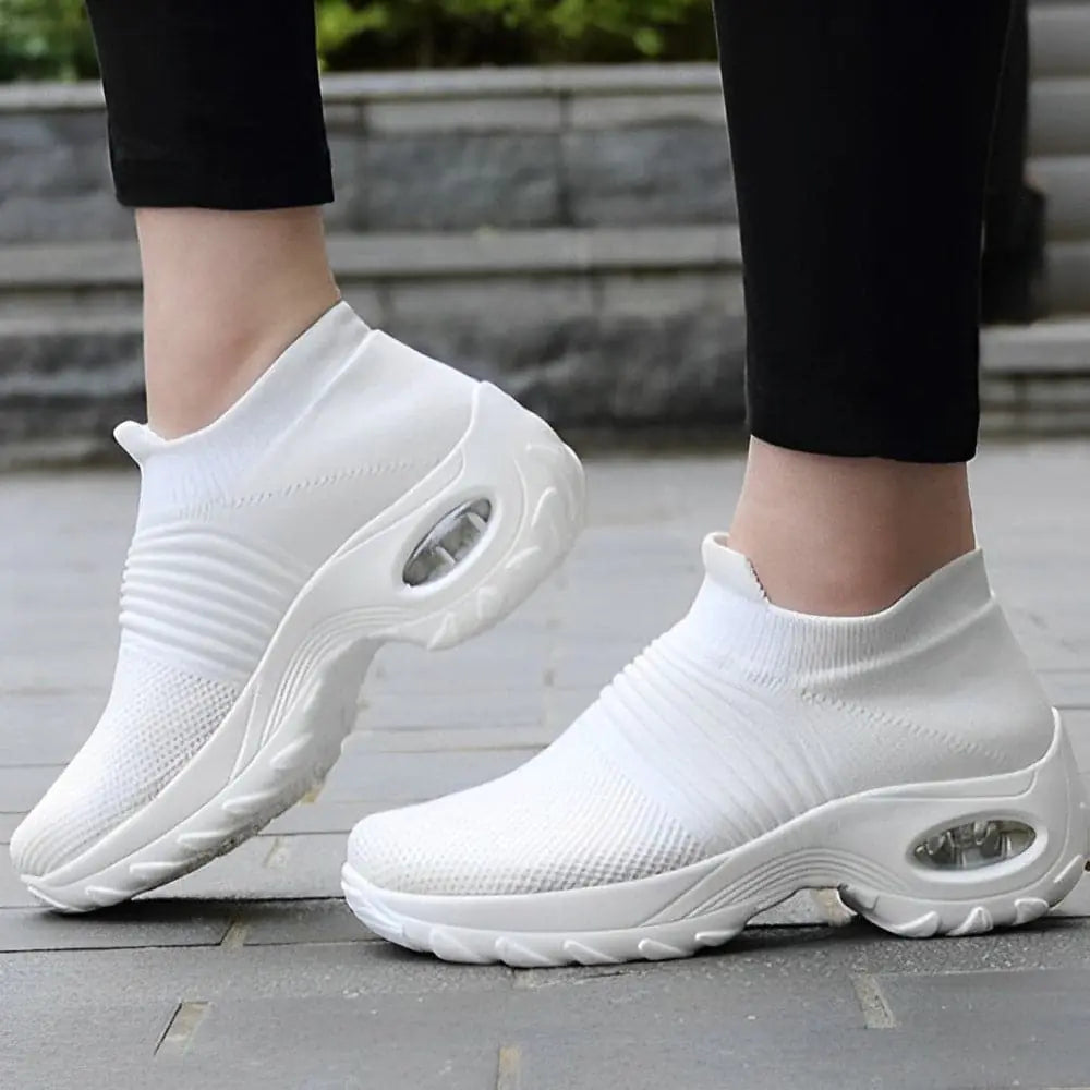 Black and gray women's sneakers by Lamp Post featuring a sleek design and comfortable fit.