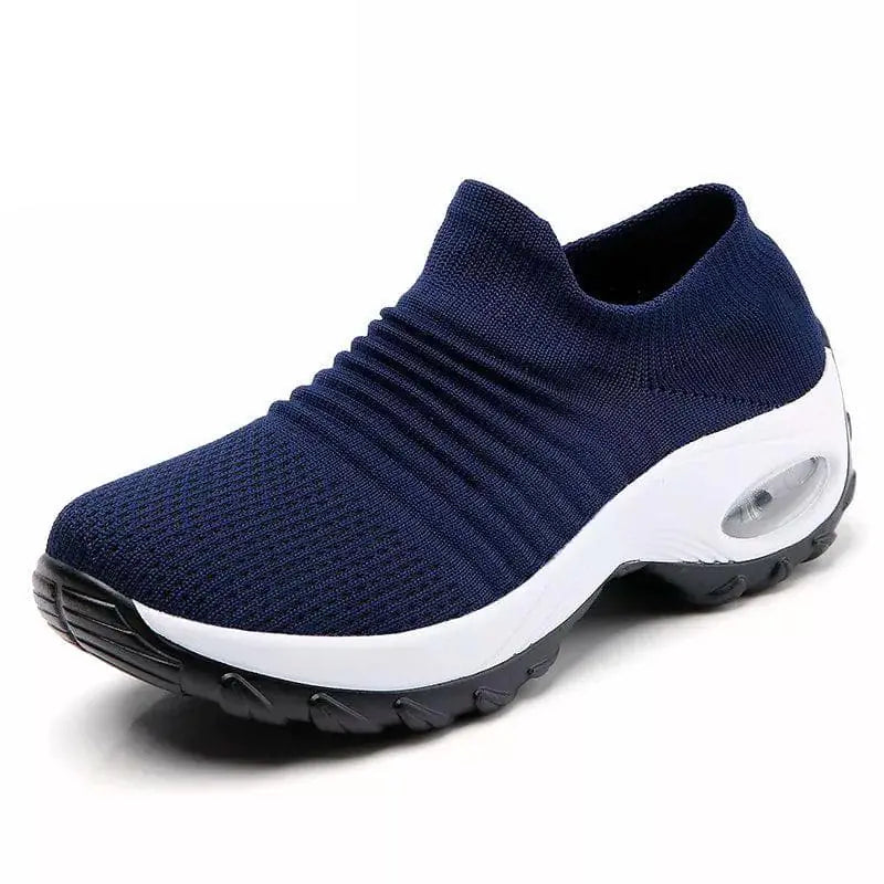 Black and gray women’s sneakers by Lamp Post featuring a sleek design and comfortable fit.